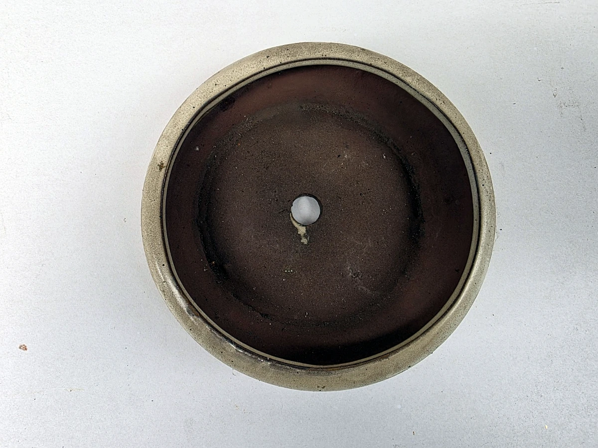 Crèmekleurige ronde schaal – bovenaanzicht